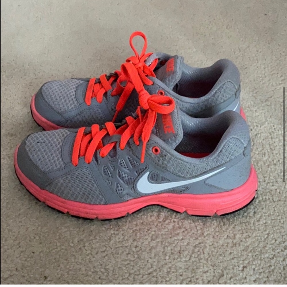 Gray and pink nike running sneakers